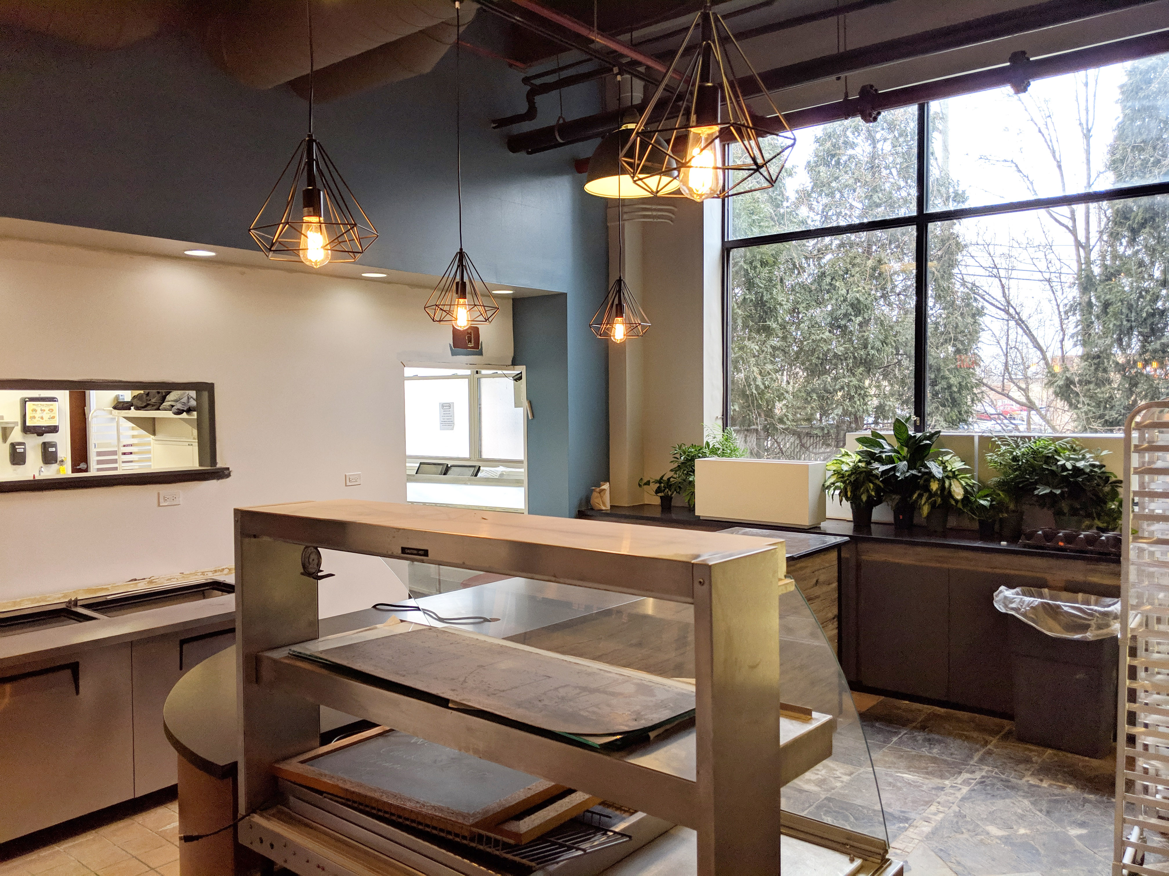 Deli Space – Weiss Properties Inc Deli with modern design and Edison bulbs